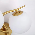 Applique murale double en verre torsadé doré moderne avec globe lumineux