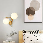 Applique murale double en verre torsadé doré moderne avec globe lumineux