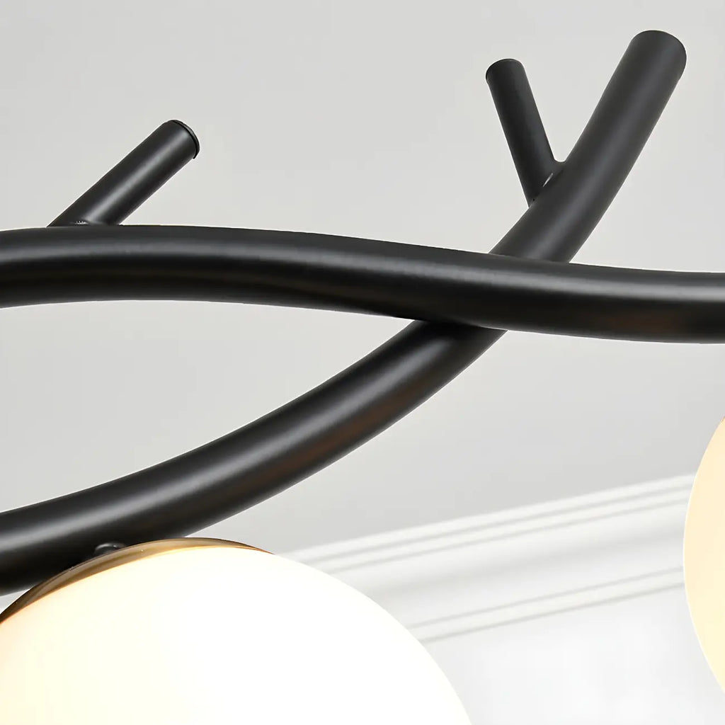 Lampadario a sospensione industriale nero con globo a 4 luci per isola cucina