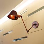 Applique da parete a LED industriale nera orientabile con braccio oscillante