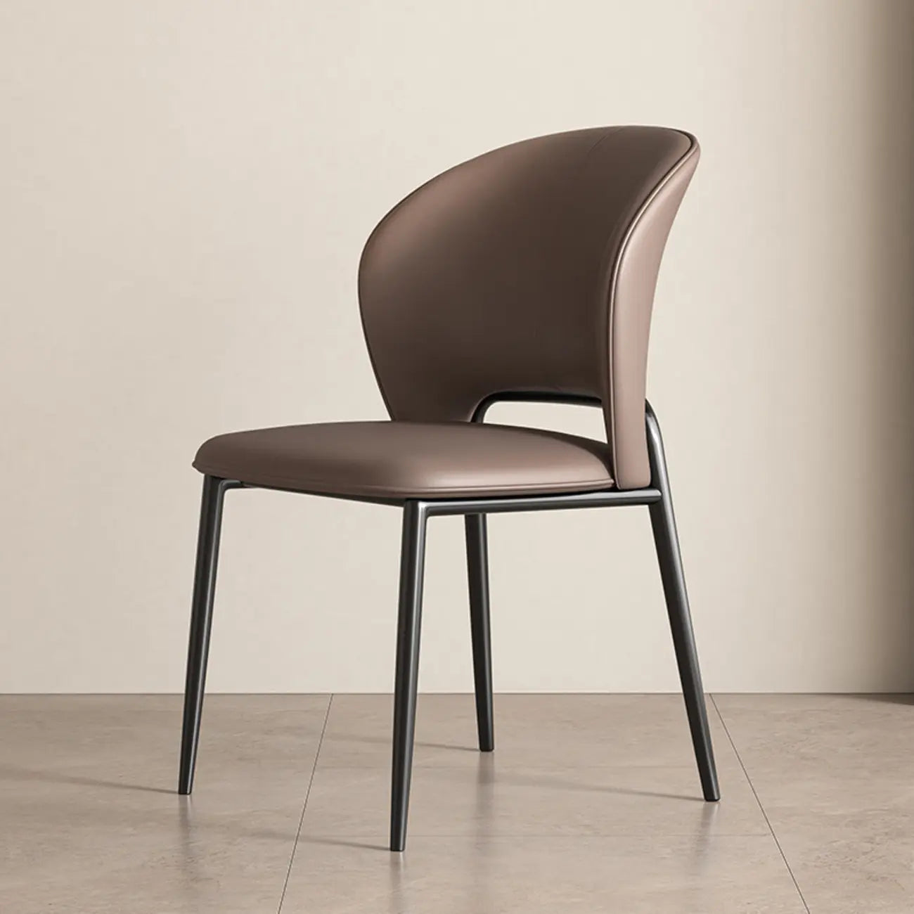 Chaise de salle à manger moderne en similicuir à dossier bas incurvé