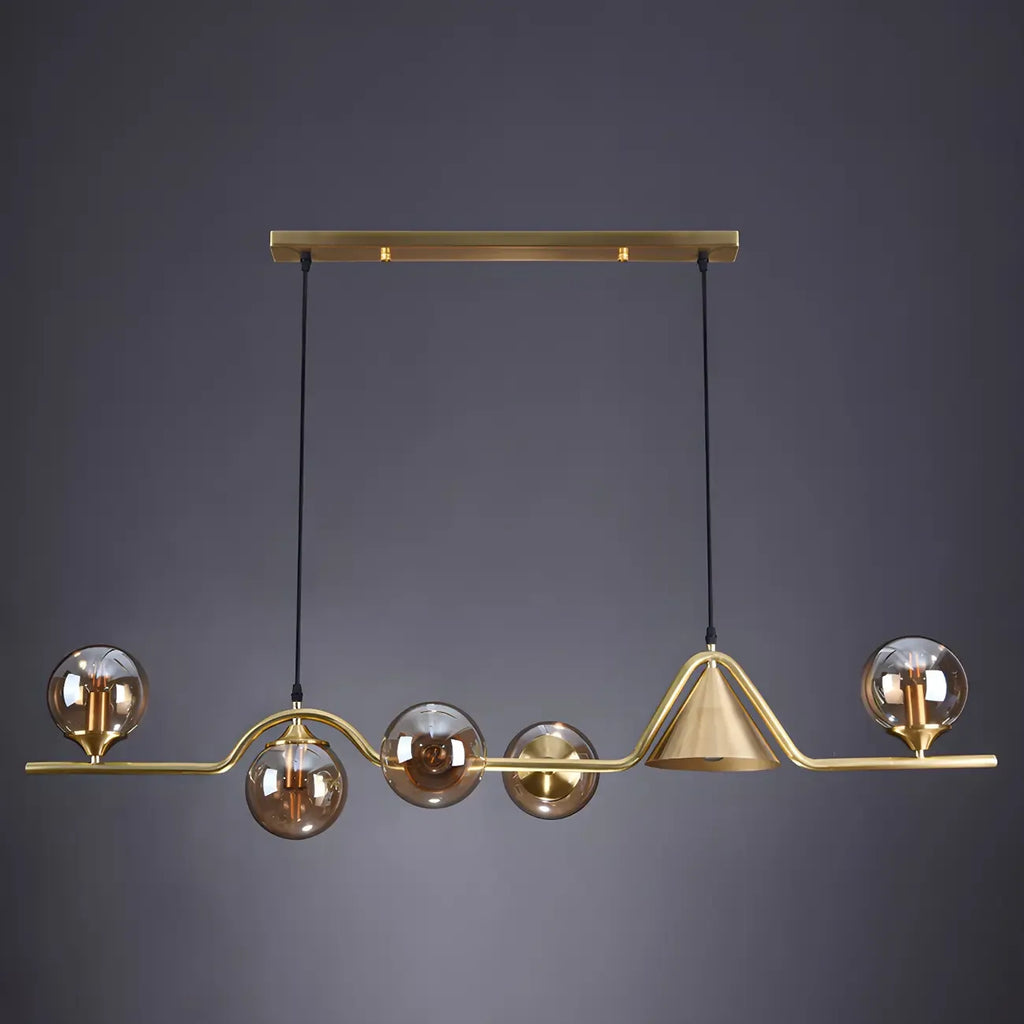 Îlot de cuisine moderne avec lustre globe en verre doré
