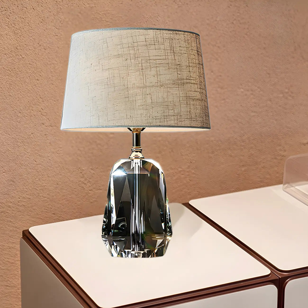 Lampe de table élégante à pied cylindrique en cristal et abat-jour en lin