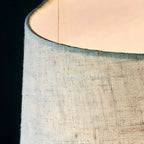 Lampe de table élégante à pied cylindrique en cristal et abat-jour en lin