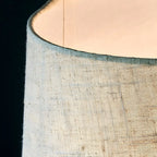 Lampe de table élégante à pied cylindrique en cristal et abat-jour en lin