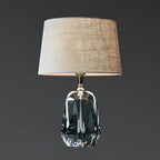 Lampe de table élégante à pied cylindrique en cristal et abat-jour en lin