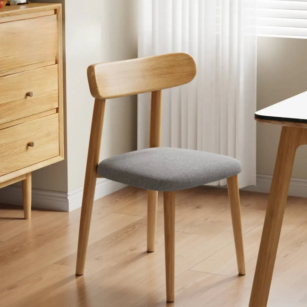Chaise de salle à manger moderne en cuir sans accoudoirs et dossier bas