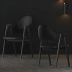 Chaise de salle à manger moderne en cuir avec dossier incurvé et accoudoirs ouverts