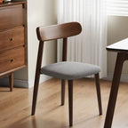Chaise de salle à manger moderne en cuir sans accoudoirs et dossier bas