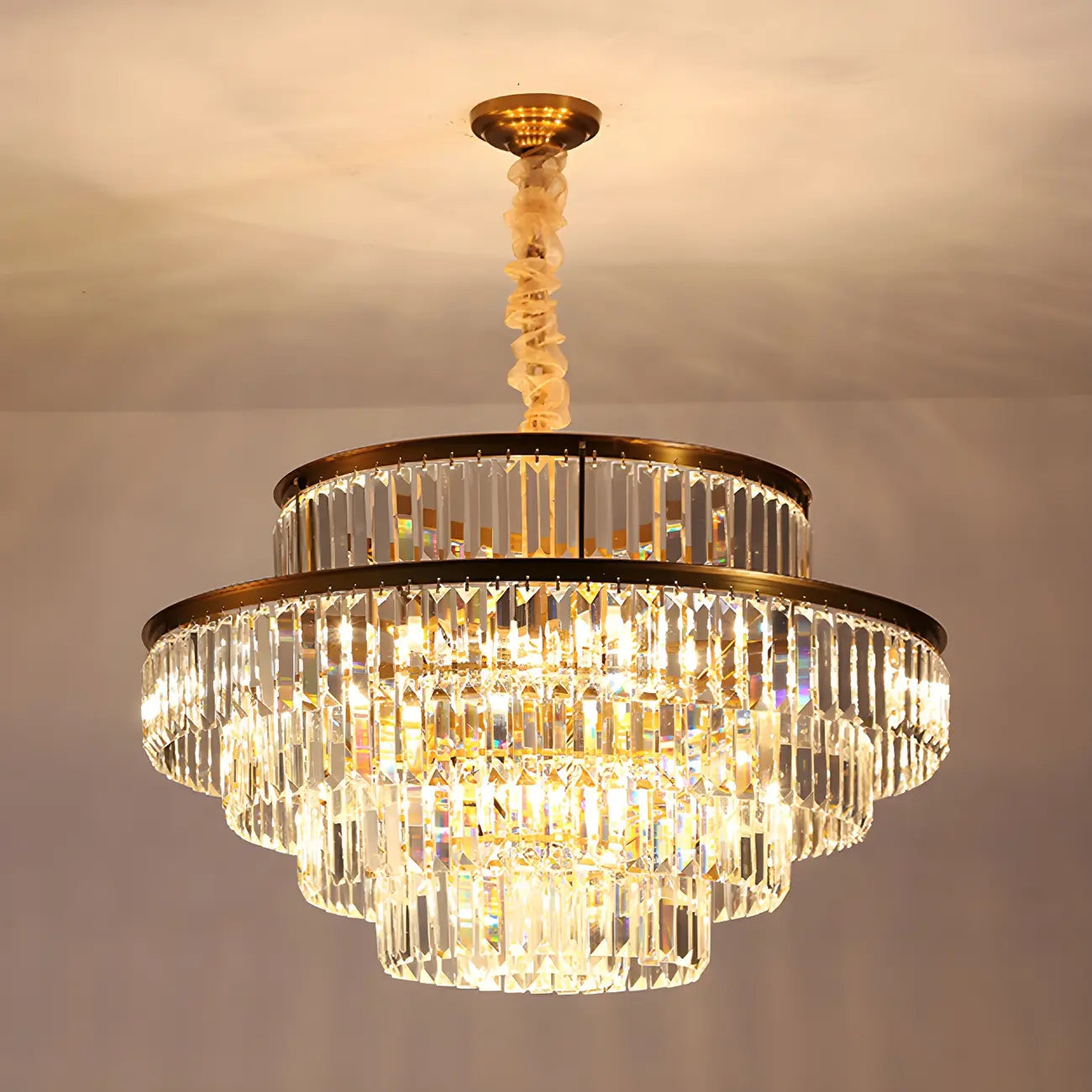 Lustre cylindrique à plusieurs niveaux en cristal doré