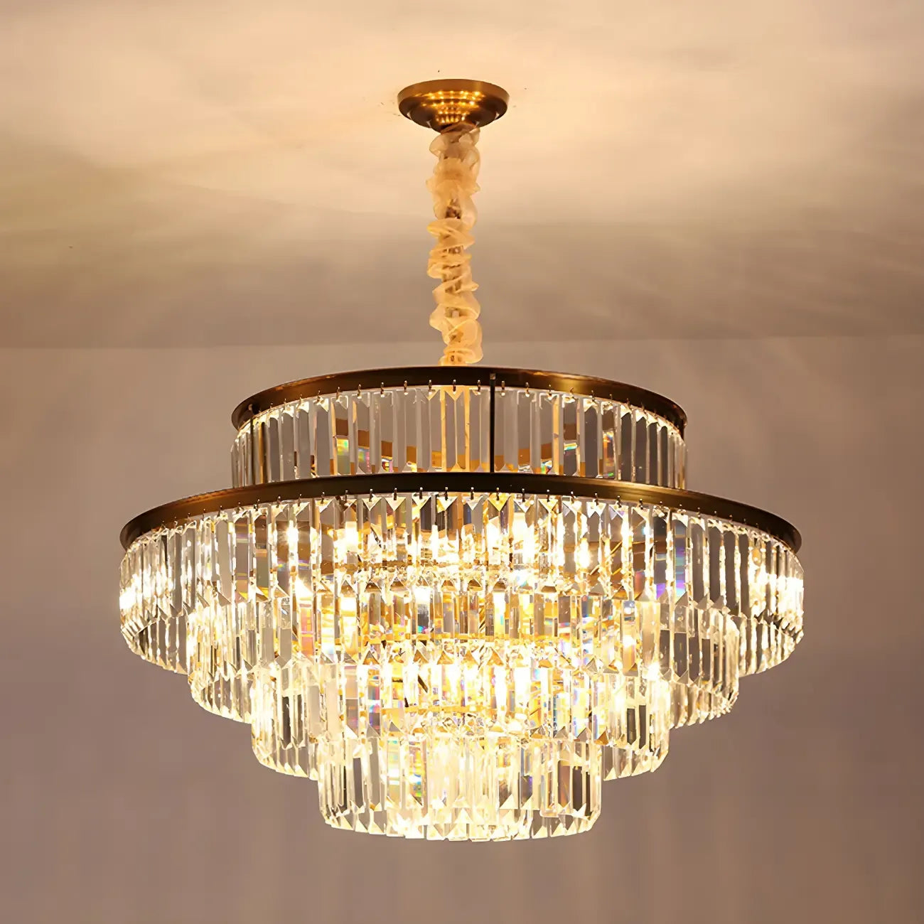 Lustre cylindrique à plusieurs niveaux en cristal doré