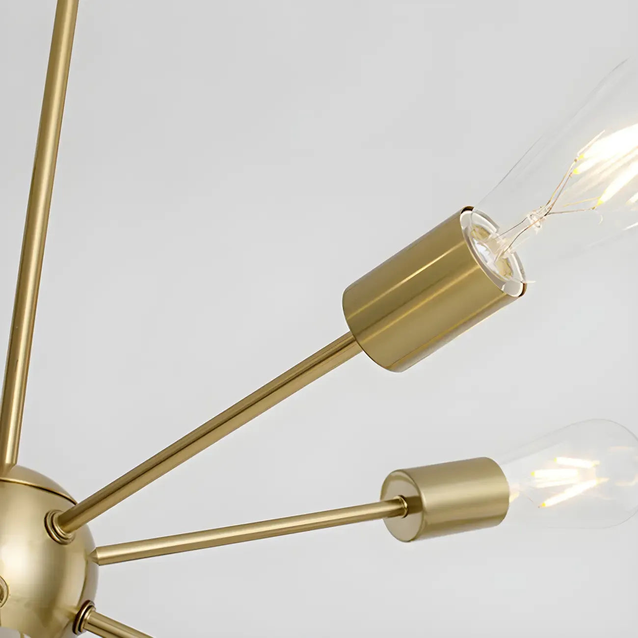 Lustre Sputnik moderne à globe doré et LED
