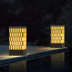 Culot de lampe rectangulaire à grille métallique noire et éclairage chaud