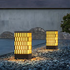 Culot de lampe rectangulaire à grille métallique noire et éclairage chaud