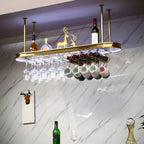 Porte-bouteilles moderne en métal doré avec support à verres