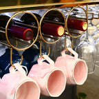 Porte-bouteilles moderne en métal doré avec support à verres