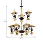 Lustre suspendu vintage en forme de lanterne dorée à 9 lumières, en verre côtelé transparent, avec un design à 2 niveaux.