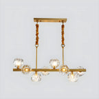 Grande suspension linéaire en métal et cristal doré pour cuisine