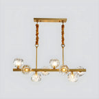 Grande suspension linéaire en métal et cristal doré pour cuisine