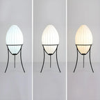 Lampe sur pied d'ambiance en forme d'œuf en tissu et en métal, trépied