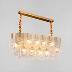 Suspension îlot de luxe en métal doré avec accents de verre