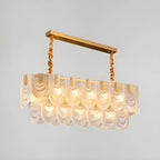 Suspension îlot de luxe en métal doré avec accents de verre