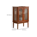 Petit vaisselier en bois brun avec porte vitrée et éclairage intégré.