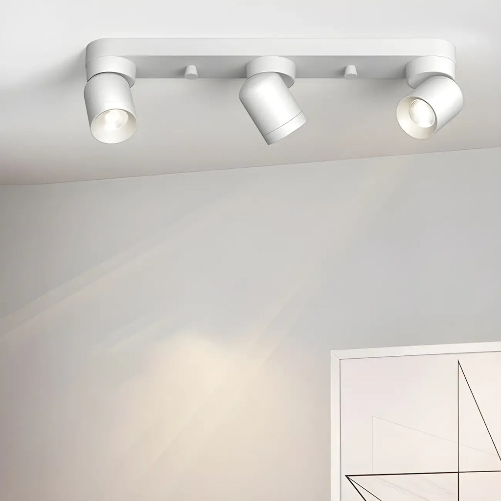 Mini projecteur LED encastré réglable en aluminium, style minimaliste.