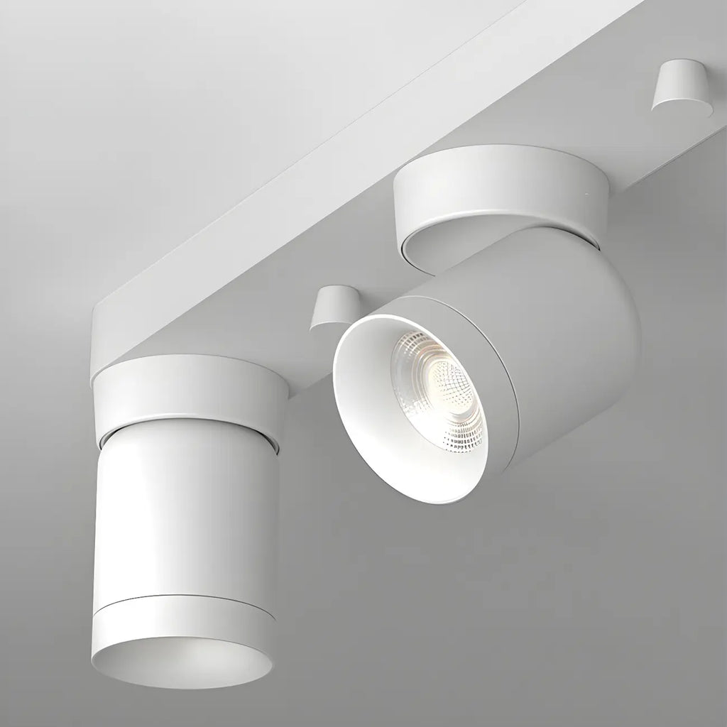 Mini projecteur LED encastré réglable en aluminium, style minimaliste.