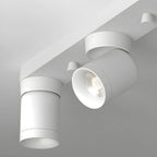 Mini projecteur LED encastré réglable en aluminium, style minimaliste.
