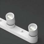 Mini projecteur LED encastré réglable en aluminium, style minimaliste.