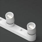 Mini projecteur LED encastré réglable en aluminium, style minimaliste.