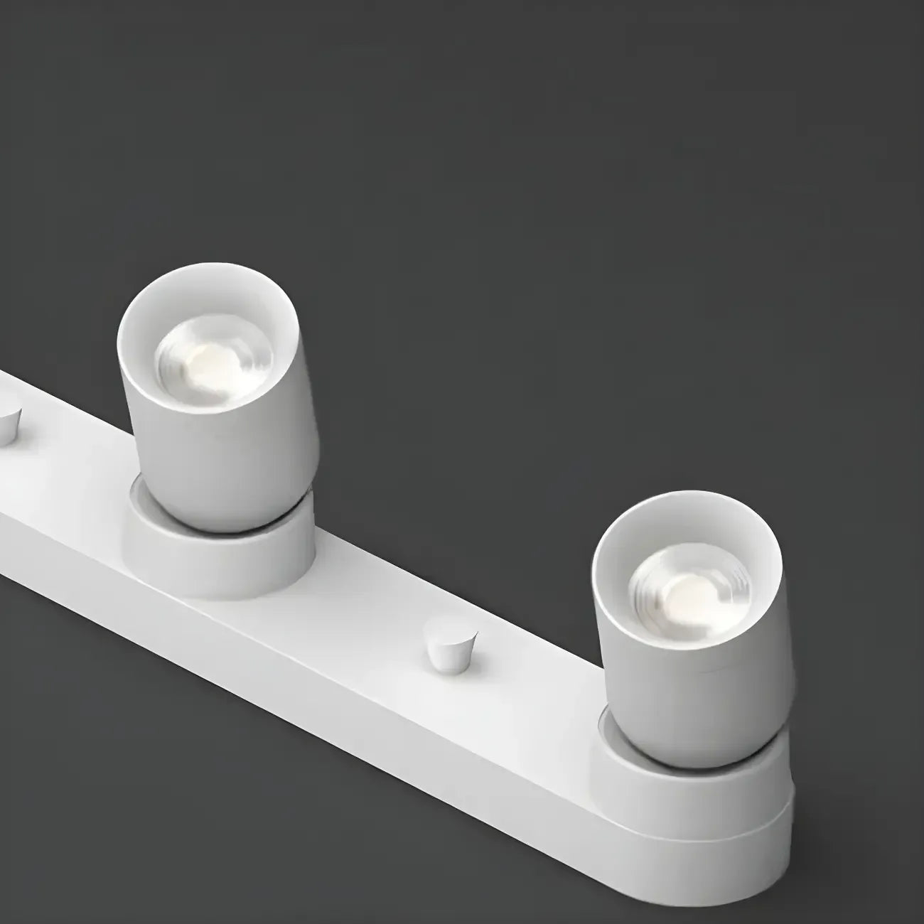 Mini projecteur LED encastré réglable en aluminium, style minimaliste.