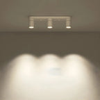 Mini projecteur LED encastré réglable en aluminium, style minimaliste.