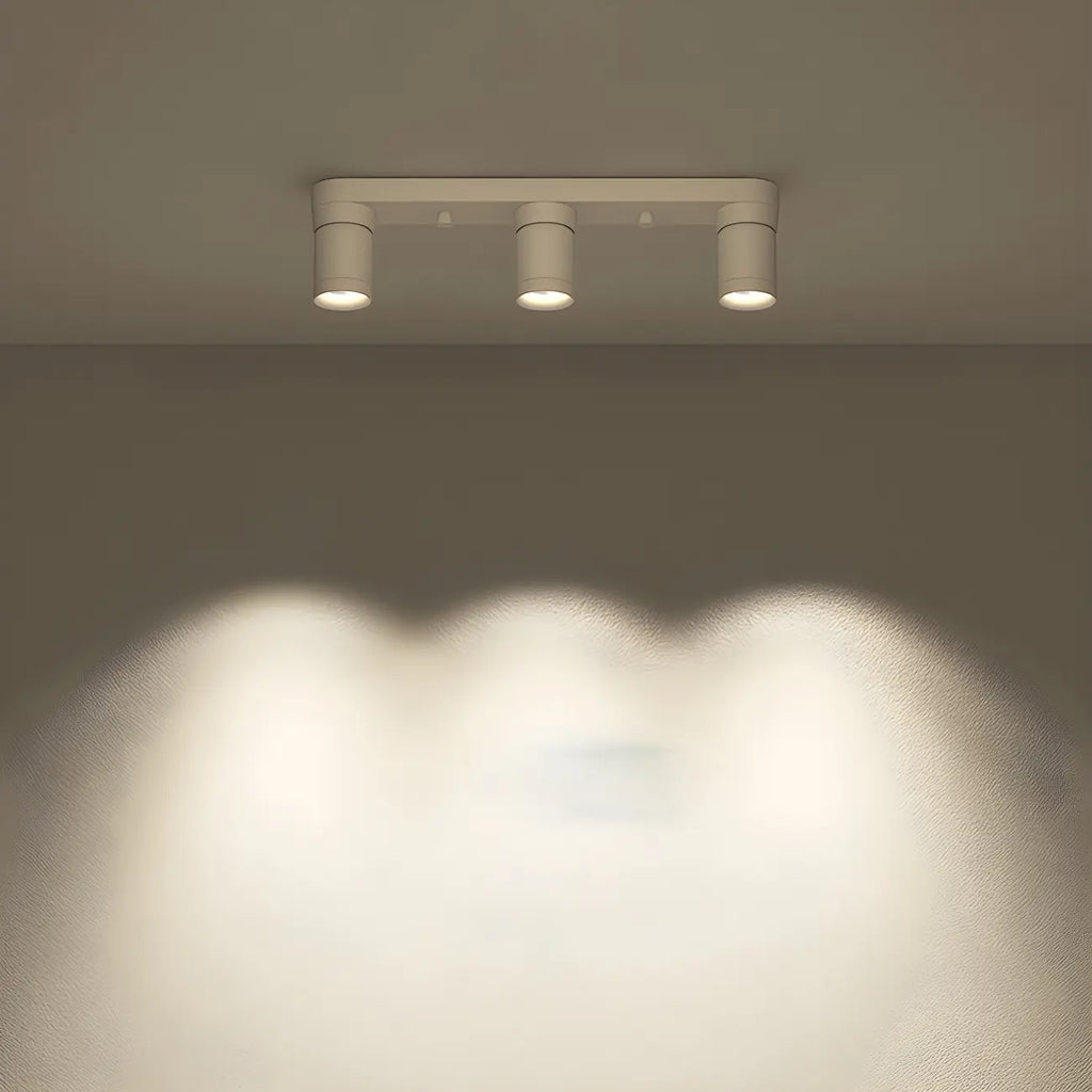 Mini projecteur LED encastré réglable en aluminium, style minimaliste.