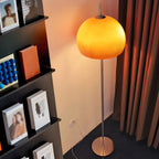 Lampadaire contemporain avec dôme en verre orange ambré