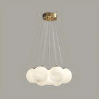Lampadario a sospensione regolabile con sfere di vetro bianco, moderno ed elegante