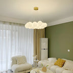 Lampadario a sospensione regolabile con sfere di vetro bianco, moderno ed elegante