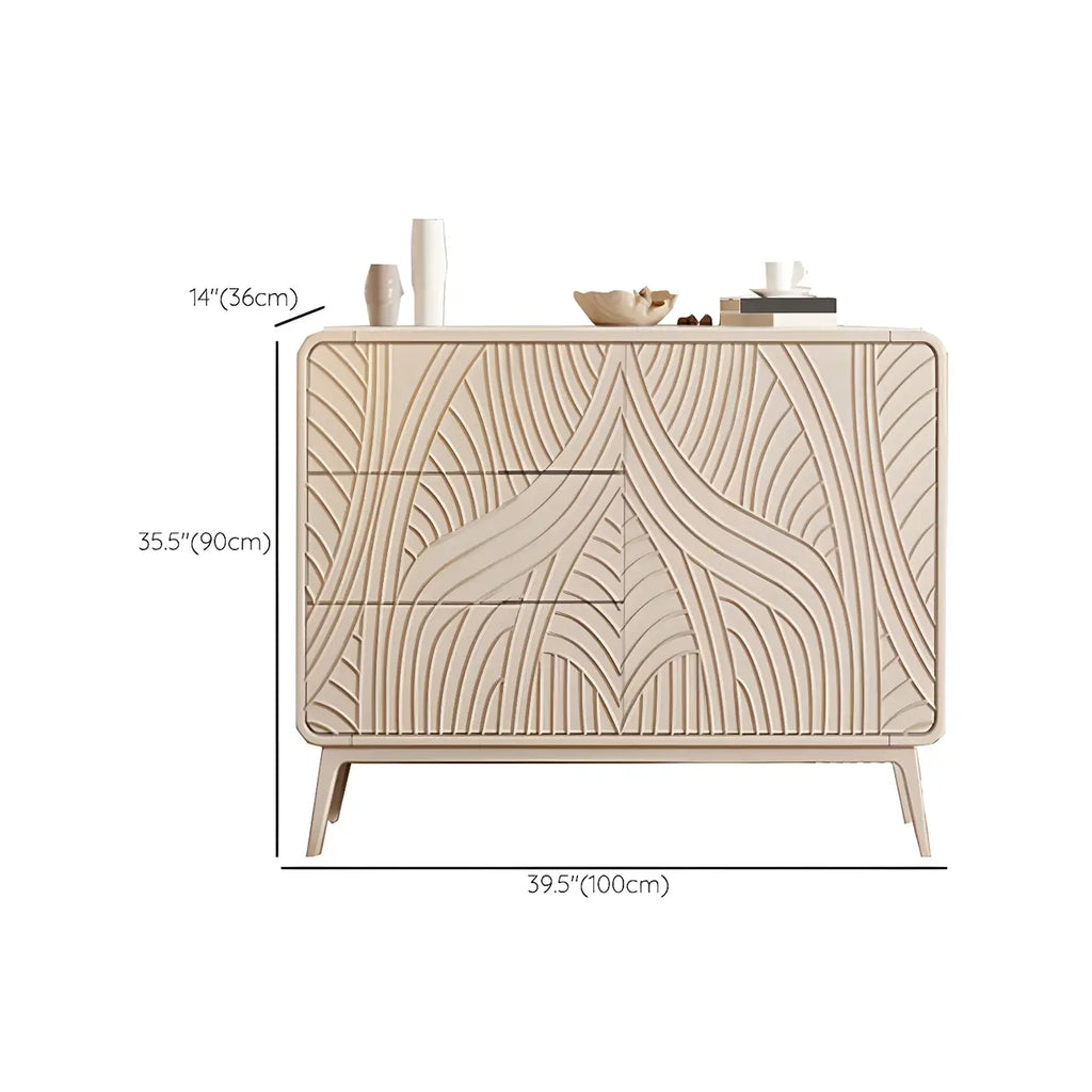 Commode glamour en bois blanc aux lignes saillantes et tiroirs à fermeture douce