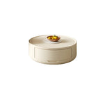 Table basse ronde et élégante en bois blanc avec tiroir