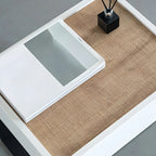 Table de chevet en forme de C avec tiroir et éclairage intégré, en acier noir et bois.