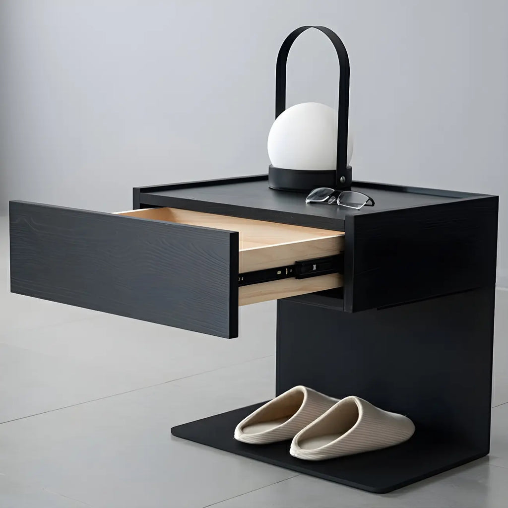 Table de chevet en forme de C avec tiroir et éclairage intégré, en acier noir et bois.