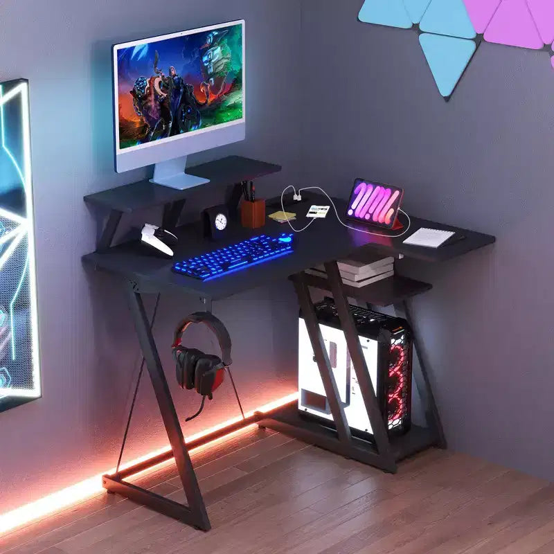Bureau gaming en L Costway avec prises et ports USB, étagère pour écran et support de casque Noir/Blanc/Rose