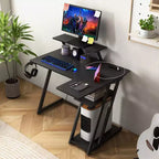 Bureau gaming en L Costway avec prises et ports USB, étagère pour écran et support de casque Noir/Blanc/Rose