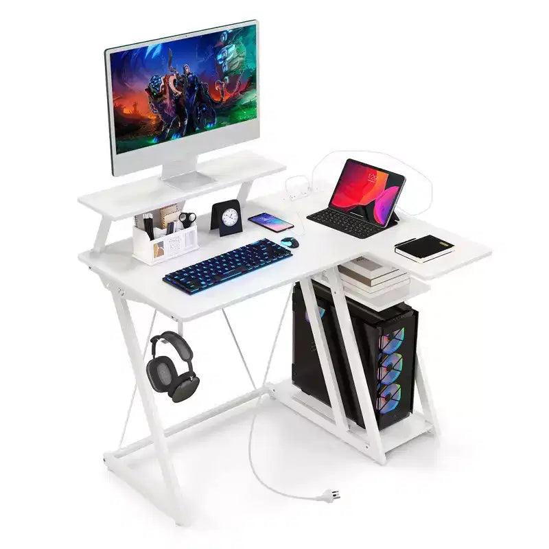 Bureau gaming en L Costway avec prises et ports USB, étagère pour écran et support de casque Noir/Blanc/Rose