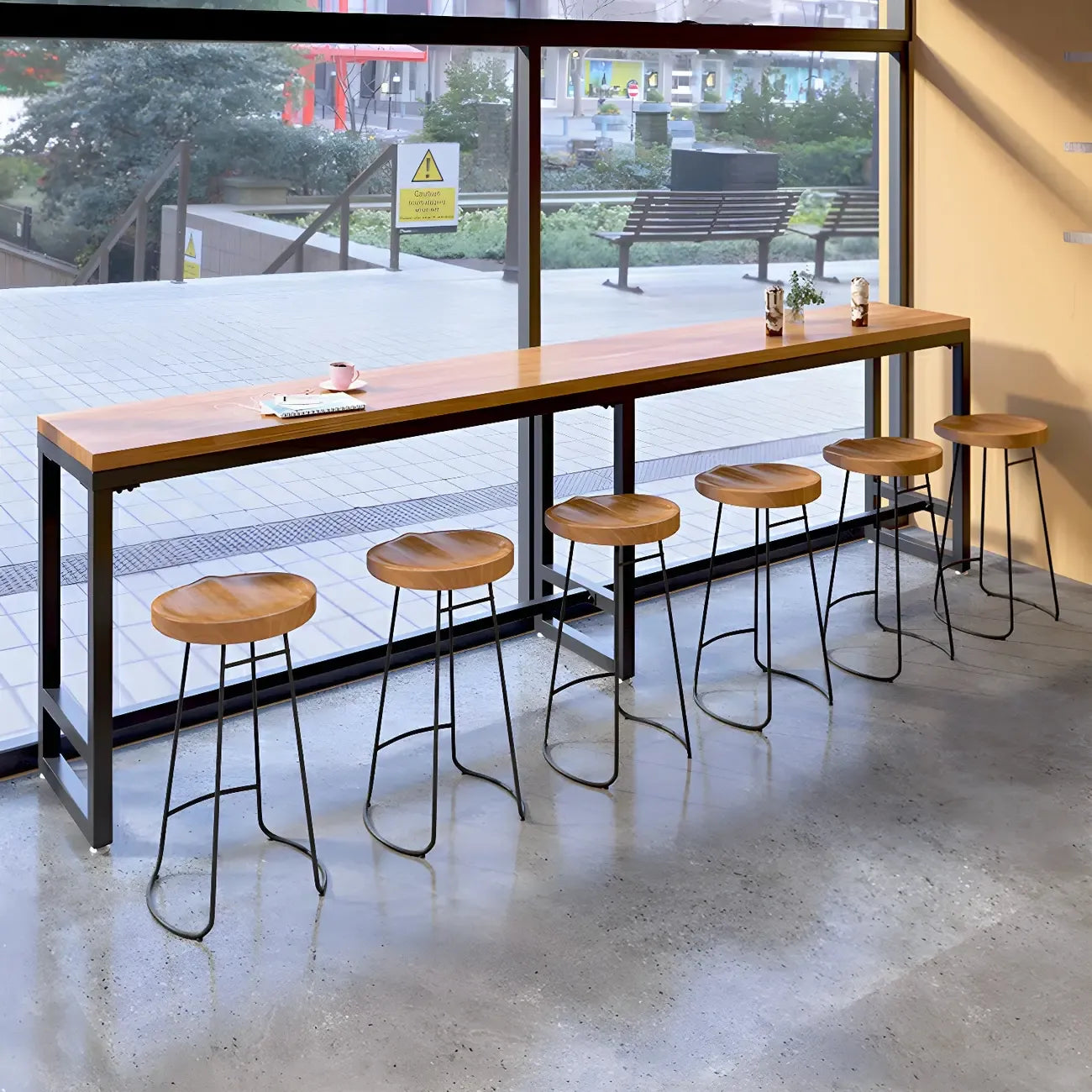 Table de bar moderne en bois brun et fer avec piètement à tréteaux