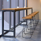 Table de bar moderne en bois brun et fer avec piètement à tréteaux
