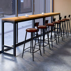 Table de bar moderne en bois brun et fer avec piètement à tréteaux