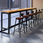 Table de bar moderne en bois brun et fer avec piètement à tréteaux