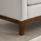 Banc rembourré élégant, pouf avec pieds en bois et coussins cylindriques